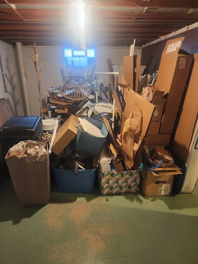 Roll-off dumpster container at job site for 8 Yard Dumpster Rental in Terre Haute